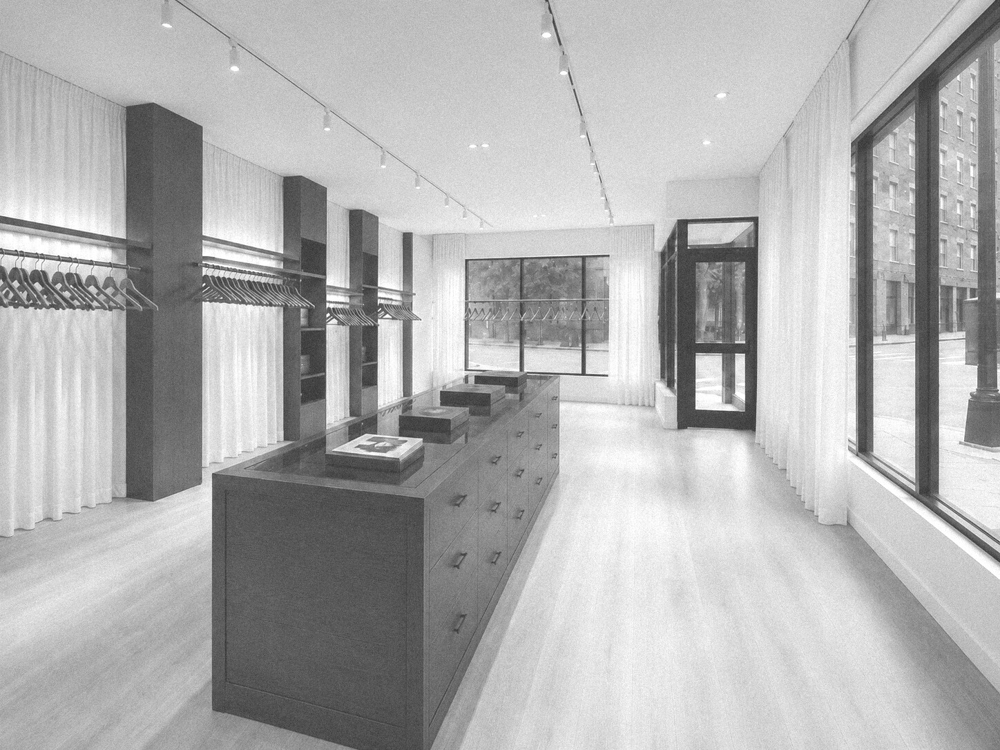 Interior of RAW98 with dark oak millwork, cream drapery and a glass-top display case